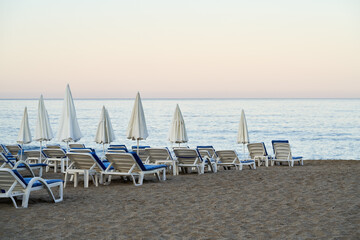 Seats at the seaside on the beach in the morning