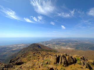 view from the Pico de Los Reales over the coastline of the Costa del Sol towards the Rock of...