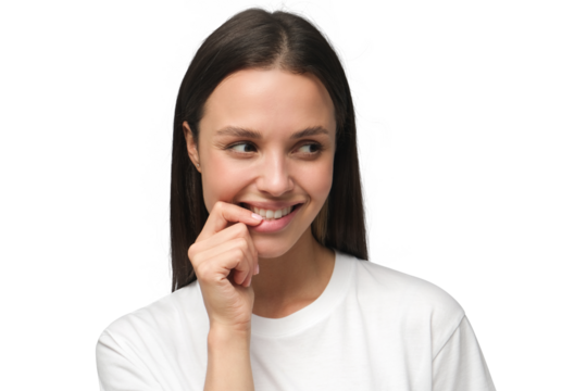 Shy beautiful young woman smiling and touching her lips