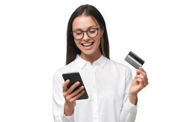 Young smiling woman holding credit card and phone - 622286228