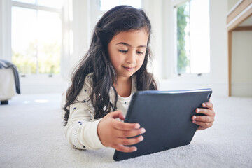 Young girl, tablet and game app or cartoon streaming online with internet, elearning and relax on...