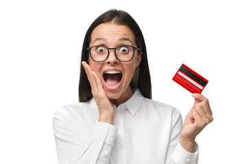Excited young woman with mouth open, holding credit card