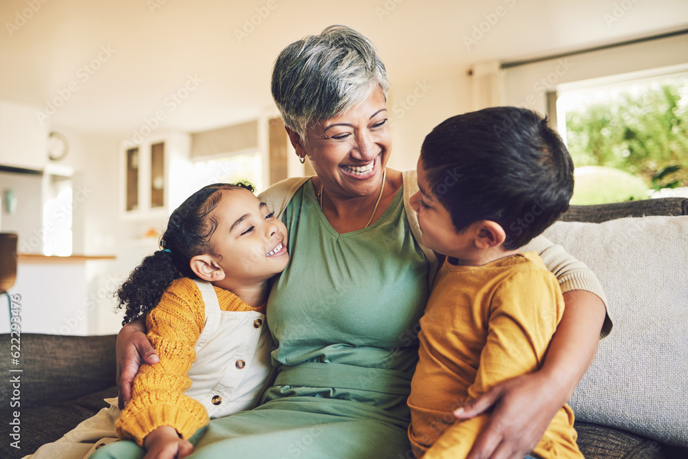 Poster Hug, grandmother or happy kids on a sofa with love enjoying quality bonding time together in family home. Smile, affection or funny senior grandparent with children siblings on house couch laughing