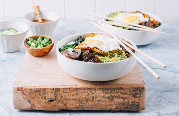 Spicy Korean salad Bibimbap with rice, egg, beef and vegetables.