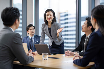 Confident Chinese business people having a meeting