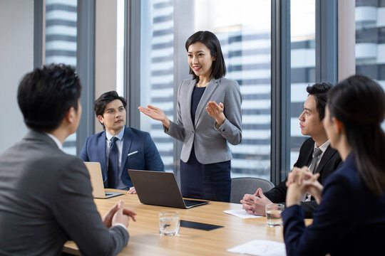 Confident Chinese business people having a meeting