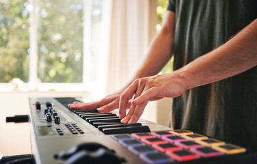 Hands, man and synthesizer piano for music, talent and skills in home studio. Closeup, musician and...