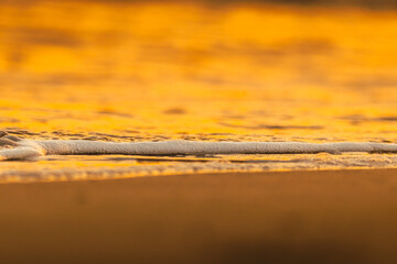 Summer beach golden hour water shore close up from puerto rico