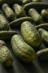 Closeup of cucumbers. Minimalist image. Dark background - 622297461