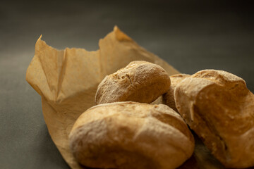 Closeup of home made bread on coking paper - 622297639