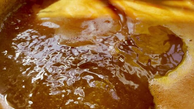 Cooking tomato sauce in a pot