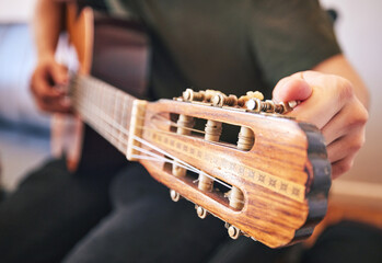 Hands, person and tuning guitar for music, talent and creative skill in sound production. Closeup,...