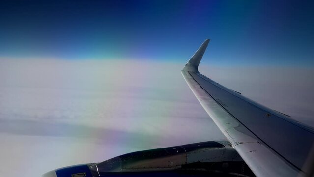 Plane wing passenger window perspective traveling