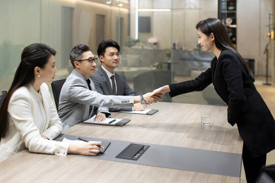 Confident Chinese businesswoman attending job interview