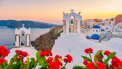 Sunset at the Island Of Santorini Greece, beautiful whitewashed village Oia with the church during...