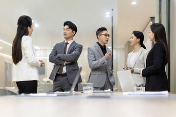 Confident Chinese business people having a meeting