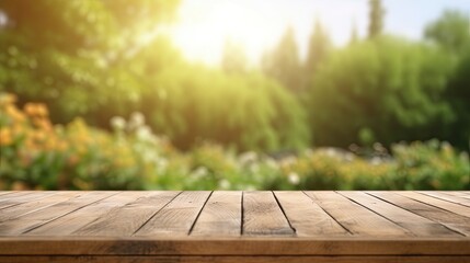 Empty wooden table top with blur background of green garden trees
