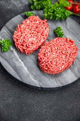 meat cutlet raw ground meat fresh beef, pork, chicken meal food snack on the table copy space food...