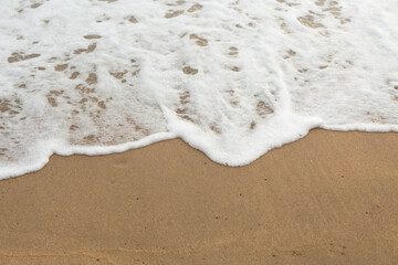 Sea Wave on the Sand Beach Close Up Background
