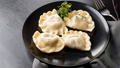 dumplings pierogi russian black plate