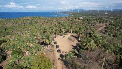 Tourists on quad bikes near Punta Patilla beach sky view