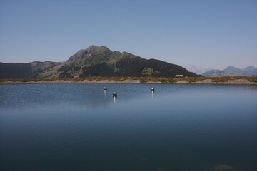 Beautiful alpine summer view with a lake at the famous Asitz summit, Leogang, Salzburg, Austria