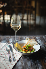 Salmon tartar with lemon, avocado and toast.