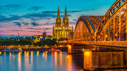 Fototapeta na wymiar Cologne Koln Germany during sunset, Cologne bridge with the cathedral. beautiful sunset at the Rhine river
