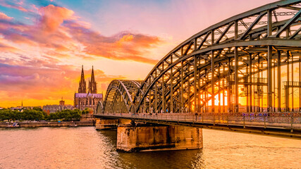 Cologne Koln Germany during sunset, Cologne bridge with the cathedral. beautiful sunset at the Rhine river