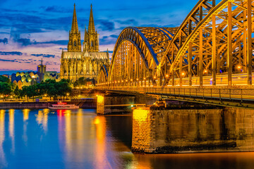 Cologne Koln Germany during sunset, Cologne bridge with the cathedral. beautiful sunset at the Rhine river