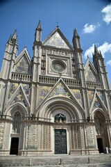 Orvieto in Italy and its wonderful white cathedral with some details of the front