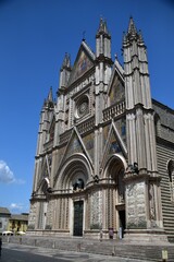 Orvieto in Italy and its wonderful white cathedral with some details of the front