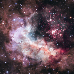 Obraz na płótnie Canvas Westerlund 2 is an obscured compact young star cluster in the Milky Way. Super star cluster in the constellation Carina. Retouched image with small DOF. Elements of this image furnished by NASA.