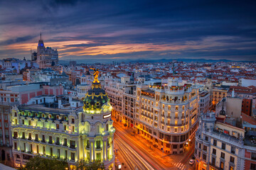 Cityscape image of Madrid, Spain during sunset.