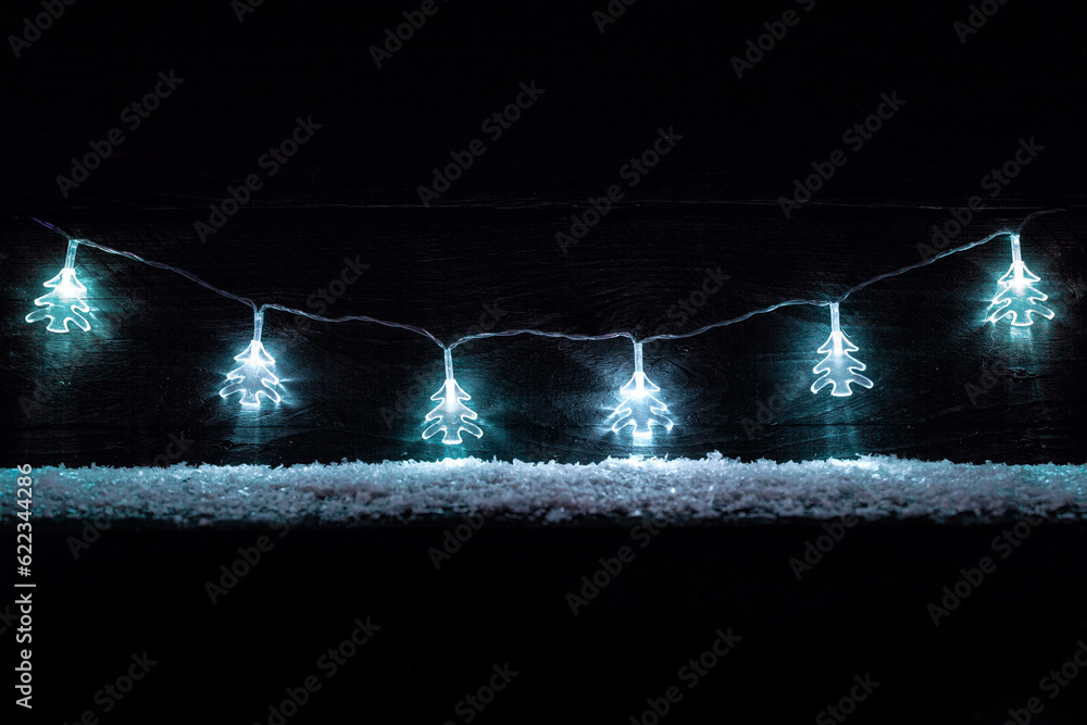 Sticker Traditional Christmas decoration lights with snow and copy space