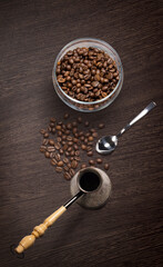 Top view of coffee attributes on a wooden background