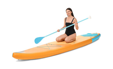 Happy woman with paddle on orange SUP board against white background