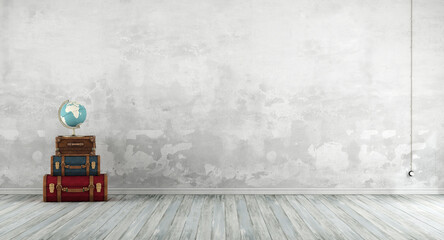 Old room with colorful leather suitcases,white wall and wooden floor - 3d rendering