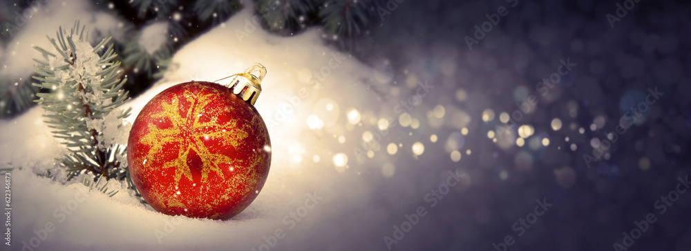 Canvas Prints red christmas ball in snow with gray background.