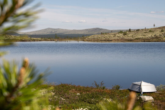 Nybutj&oslash;nna lake between Buh&oslash;gda and Gr&aring;kletten mountain in Engerdal in Norwya