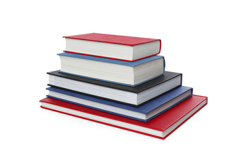 Stack of different hardcover books on white background