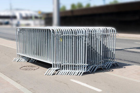 Many movable metal fences