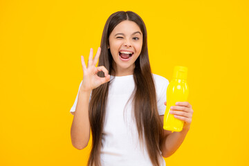 Girl teen hold water bottle. Water bottle and healthy life. Health and water balance. Drink and...
