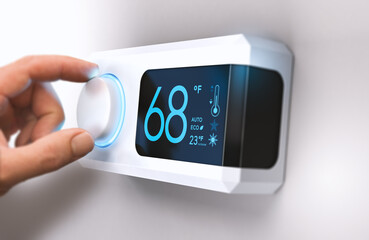 Hand turning a home thermostat knob to set temperature on energy saving mode. fahrenheit units. Composite image between a photography and a 3D background. - Powered by Adobe