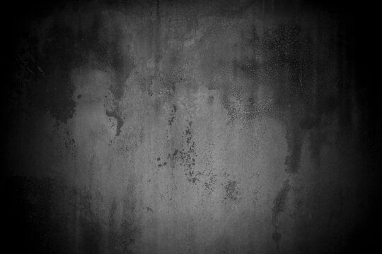 Old wall texture cement dark black gray background abstract grey color design are light with white gradient background. © Kamjana