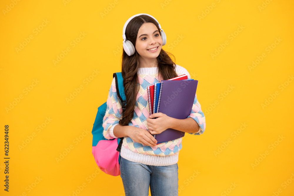 Sticker school girl, teenage 12, 13, 14 years old in headphones and books on isolated studio background. sch