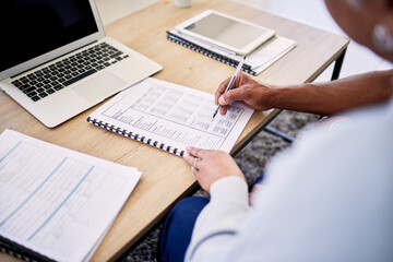 Couple, tax documents and hands with writing, financial review and planning for budget in home....