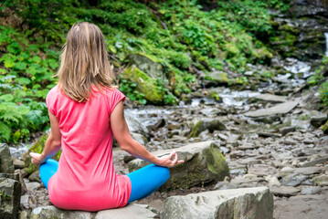 serenity and yoga practicing in the forest