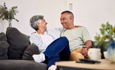 Obraz premium Love, smile or laughing senior couple bonding, relax and enjoy quality time together, funny conversation or chat. Lounge communication, marriage humour or elderly people laugh at home retirement joke