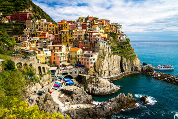 Fototapeta na wymiar Traditional picturesque Manarola village, Cinque Terre, Italy, Europe. The Cinque Terre is a rugged portion of coast on the Italian Riviera.